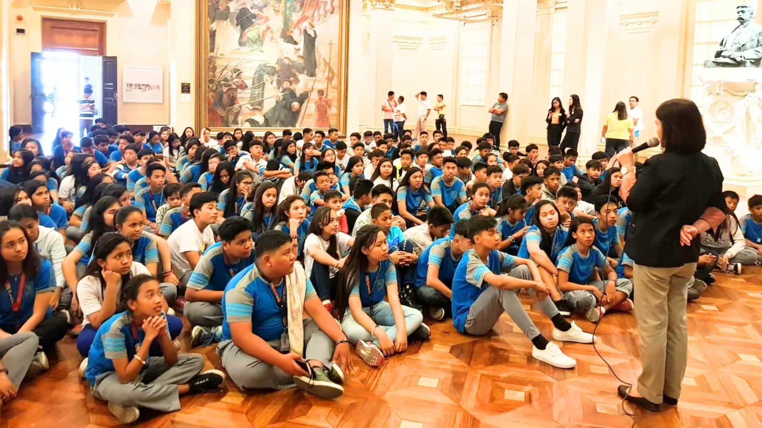 Students seated at an educational programme